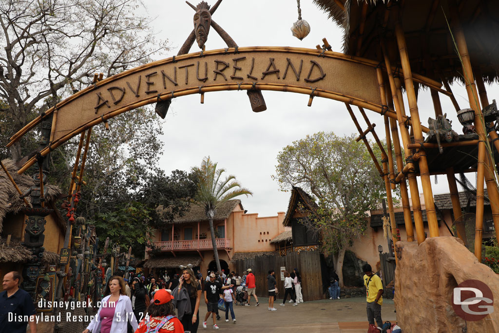 The first set of walls are gone in Adventureland.  The set nearest the restrooms is still there.