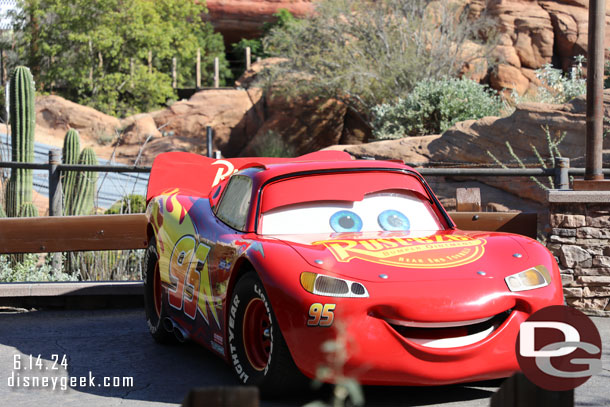Lightning McQueen backed into and meeting guests in the extended queue portion of Radiator Springs Racers.