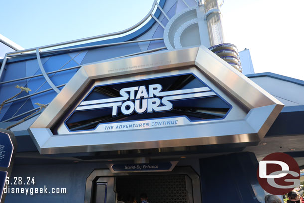 5:57pm - Found my group and heading into Star Tours