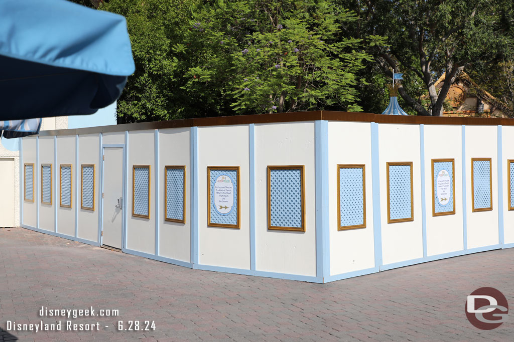 Some pavement work by the popcorn stand area in Fantasyland 