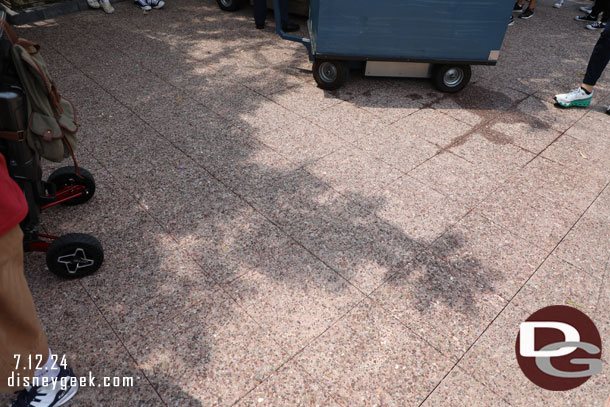 The walls are down from near the kiosk/vending area.  Looks like temporary pavement was put in.