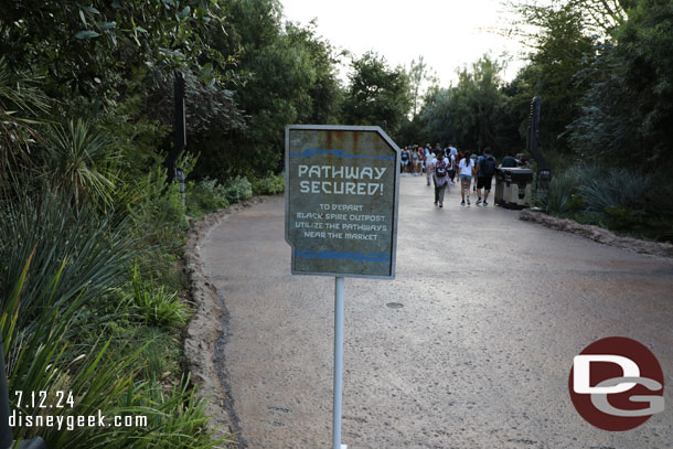 Signs up and cast members stationed to warn guests that the walkway to Critter Country is closed