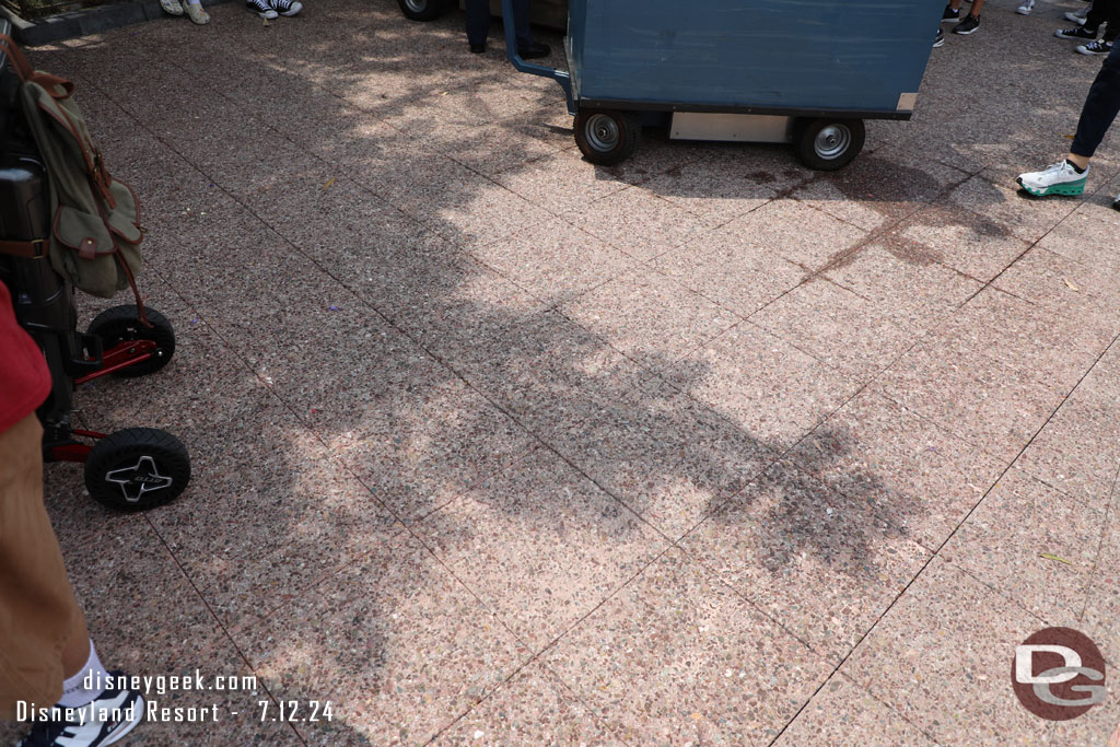 The walls are down from near the kiosk/vending area.  Looks like temporary pavement was put in.