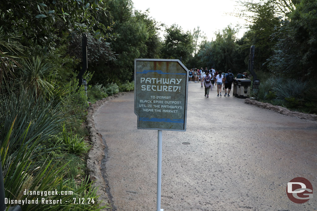 Signs up and cast members stationed to warn guests that the walkway to Critter Country is closed