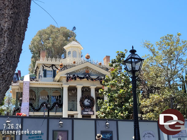 Haunted Mansion exterior is ready for the holidays, really too early for me to see this in July.