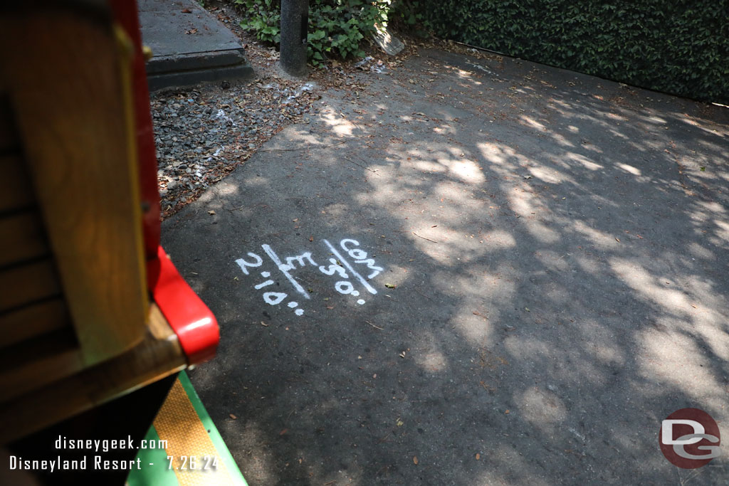 Markings on the ground near the crossing behind the former Innoventions building.