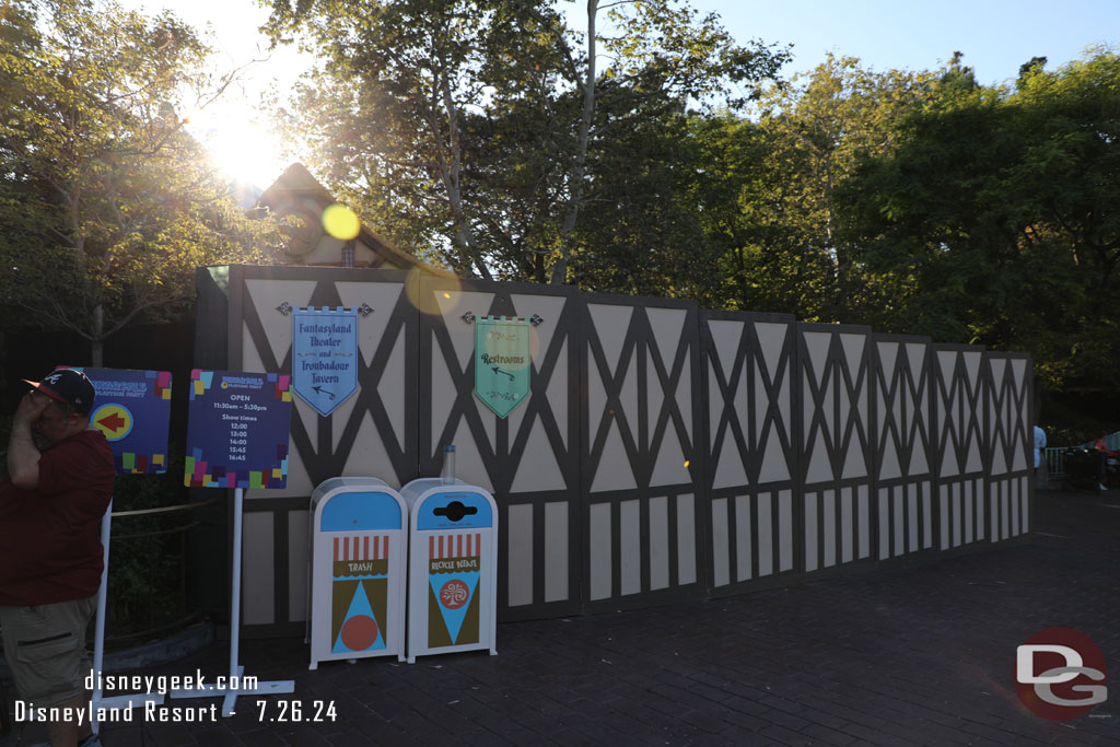 The renovation walls for the pavement project near the Fantasyland Theatre