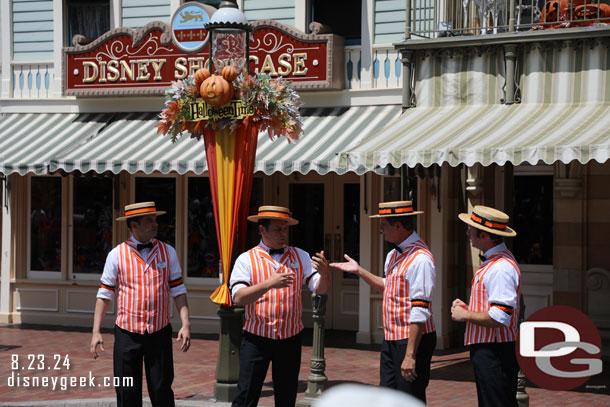 The Dapper Dans of Disneyland sporting Orange for Halloween