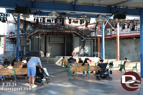 The backlot stage has nothing scheduled. Guests are just enjoying a seat in the shade.