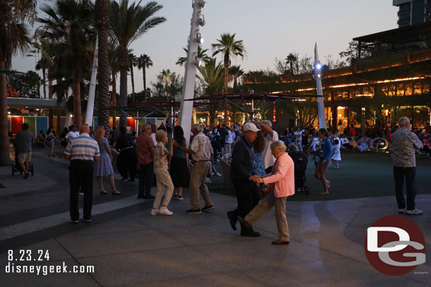 A number of couples dancing as the Alpha Rhythm Kings performed in Downtown Disney this Evening