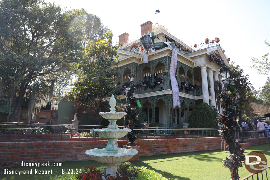 The fountain that used to be in the park outside the gate is now on the lawn.