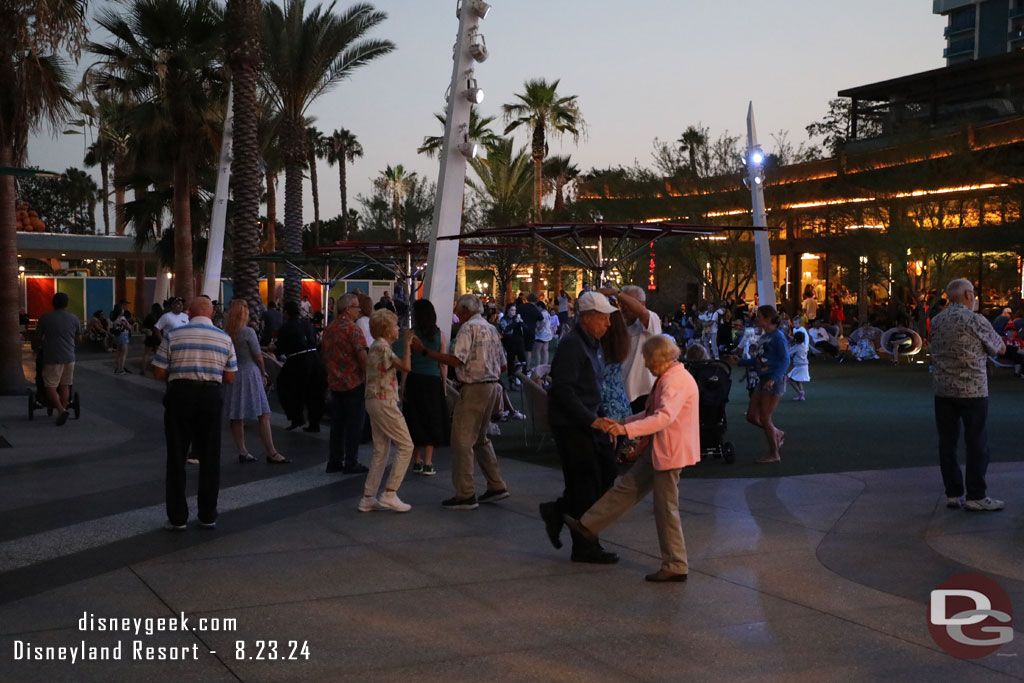 A number of couples dancing as the Alpha Rhythm Kings performed in Downtown Disney this Evening