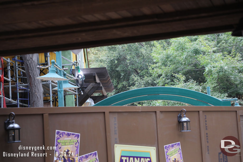 A new structure rising above the wall just outside the queue building.