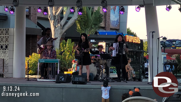 Eva and the Vagabond Tales performing on the Downtown Disney Stage