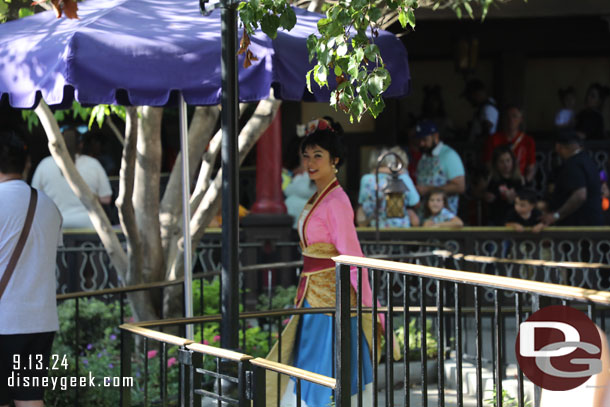 Mulan was greeting guests.