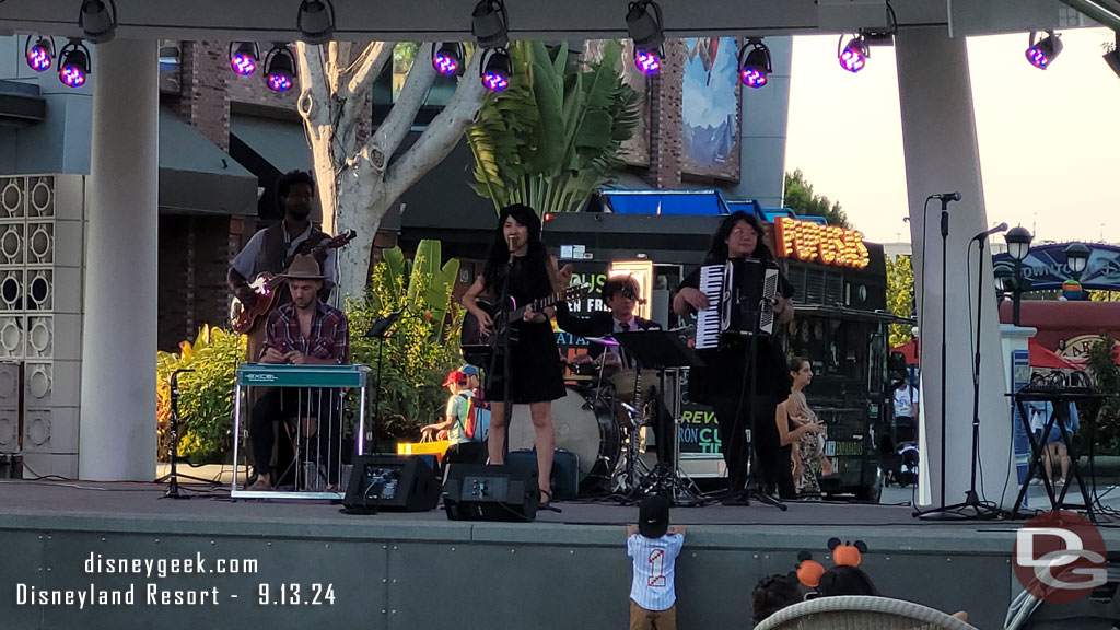 Eva and the Vagabond Tales performing on the Downtown Disney Stage