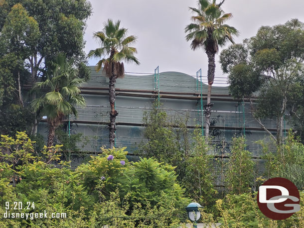 Renovation on the Indiana Jones show building continues.  Trees are being painting onto it.