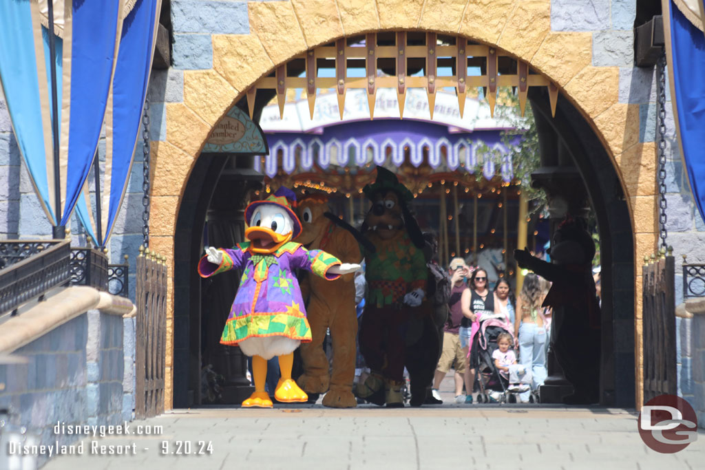 Donald Duck leading the characters out