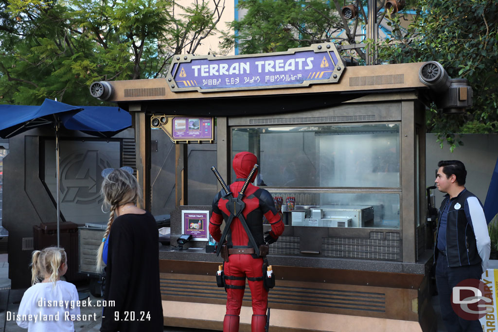 Deadpool pondering buying a churro