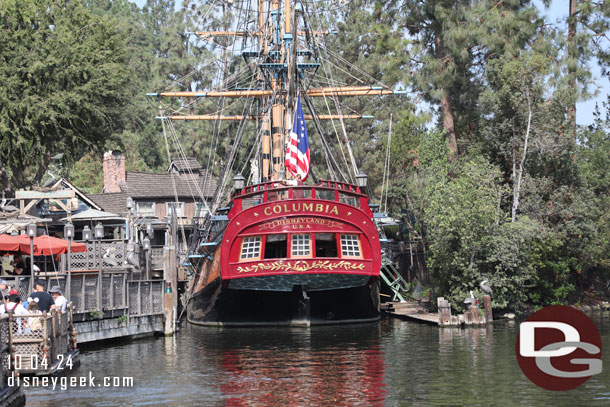 Cast members hoisting the U.S. Flag as the Columbia prepares to set sail.  The flag looked really bright and new.