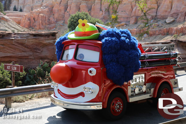 Red cruising down Cross Street with his clown costume for Haul-O-Ween