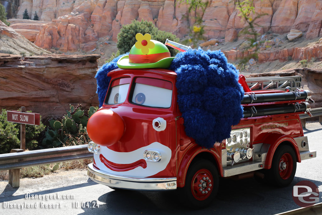 Red cruising down Cross Street with his clown costume for Haul-O-Ween