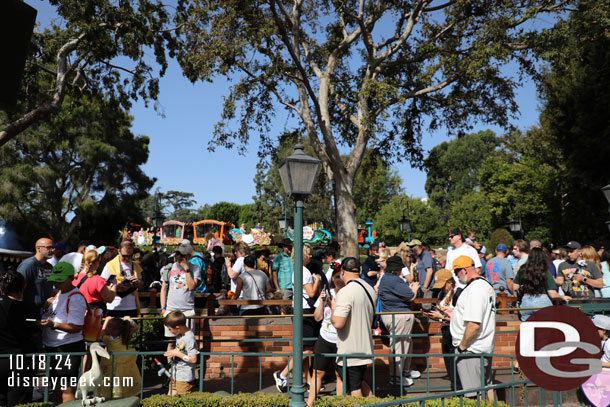 11:10am - Fantasyland was busy.  The queue for Storybook Land canal boats spilled out to the walkway.