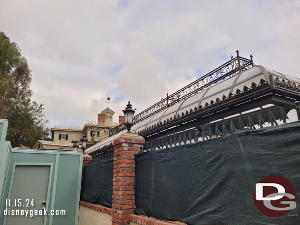 The Haunted Mansion queue is now partially covered