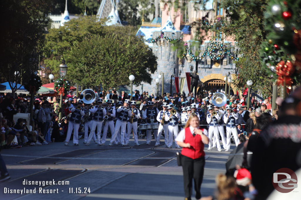 The Disneyland Band making its way along Main Street USA .