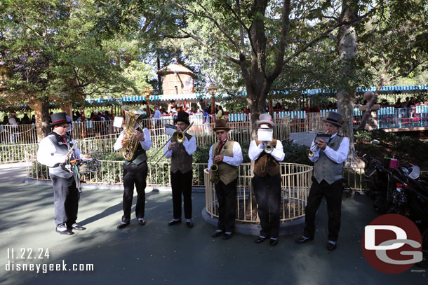 The Dickens Yuletide Band performs several sets outside the theatre. Here they are near the Toontown Train Station.  