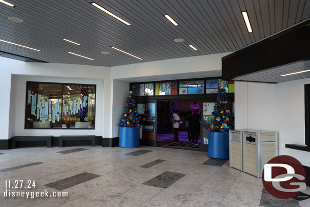Trees flank the entrance