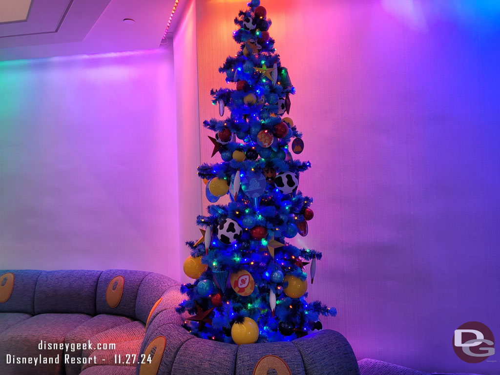 There area a number of Christmas trees decorated for different Pixar films throughout the lobby area.  No large tree. This is a Toy Story tree