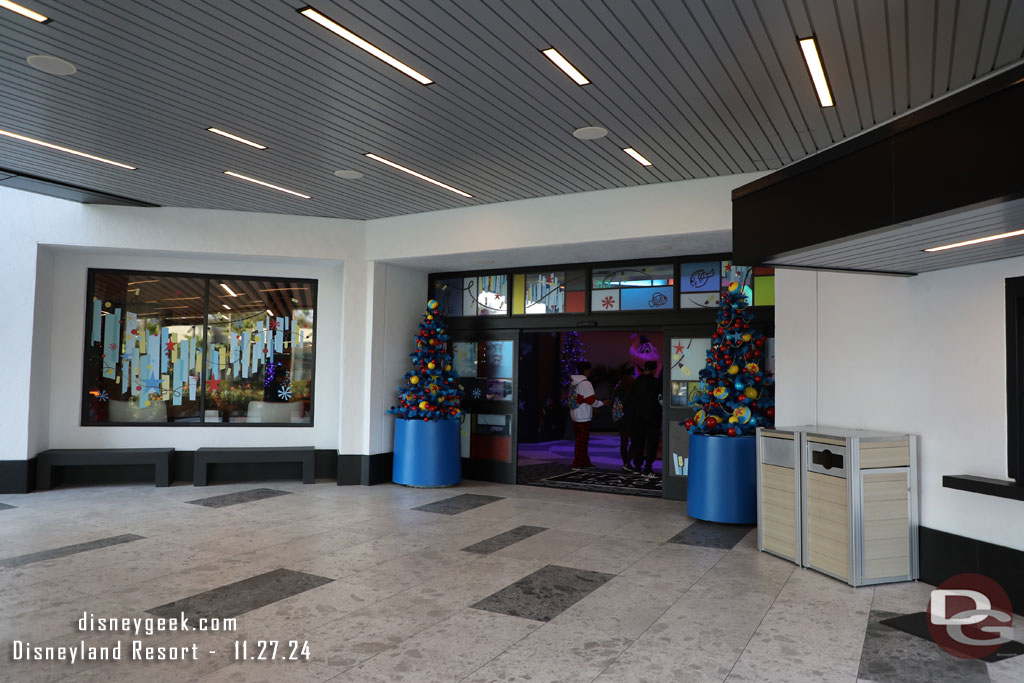 Trees flank the entrance