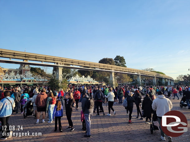 The gates for Disneyland just opened so we got in line.