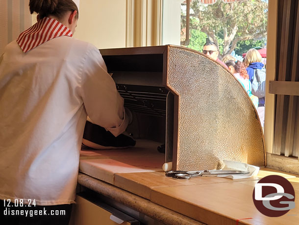 Cast members making candy canes.