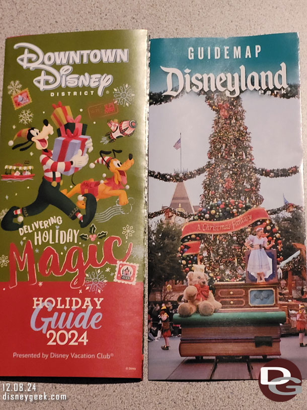 The Disneyland guidemap has changed from Tianas to A Christmas Fantasy Parade.  There are also Downtown Disney Holiday guides.  DCA is the same Toy Drummers.