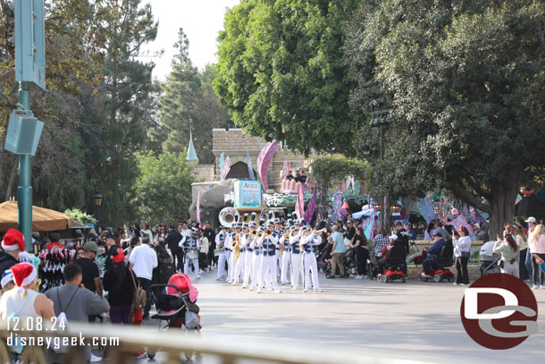 The Disneyland Band arriving for a performance in it's a small world mall.