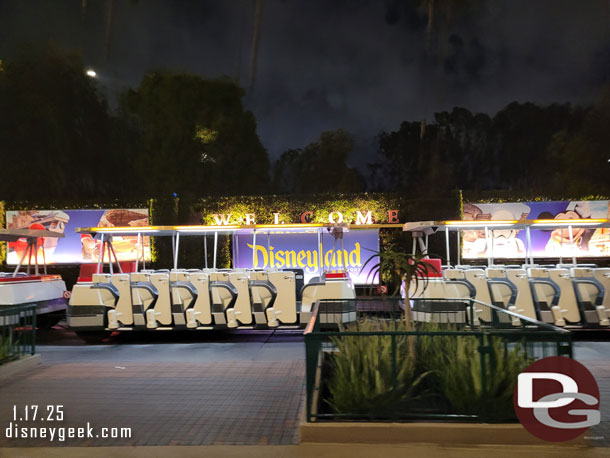 9:27pm - The tram stop billboards are generic Disneyland ads not Lunar New Year