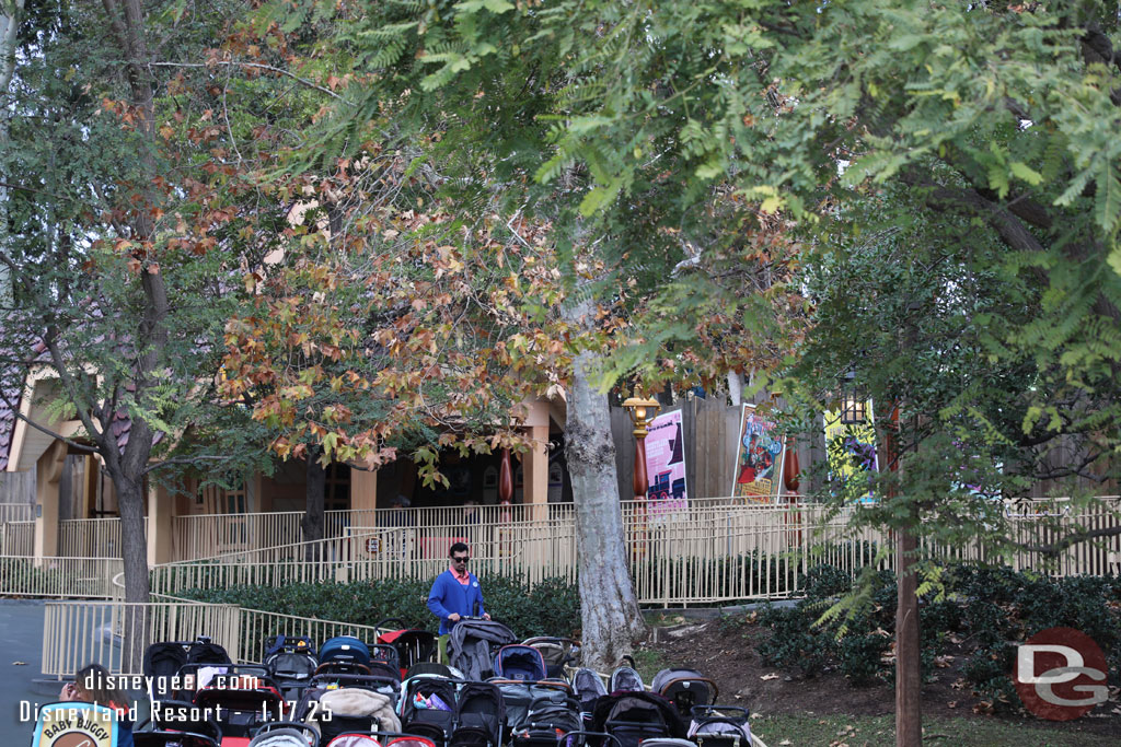 Cast members and posters at the train station.