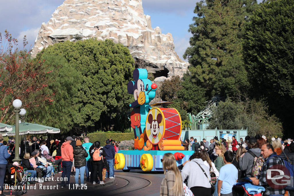 The 1:45pm Mickey and Friends Cavalcade making its way through the hub