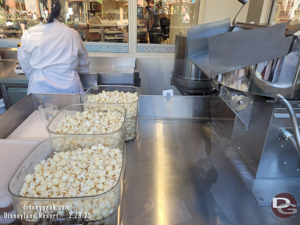 Working on a new batch of caramel corn at Disney Wonderful World of Sweets