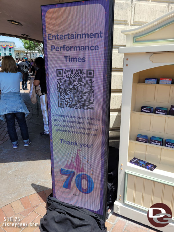A new electronic sign with a QR code to scan for show times.  It loads the Disneyland App and takes you to the schedule for the day.