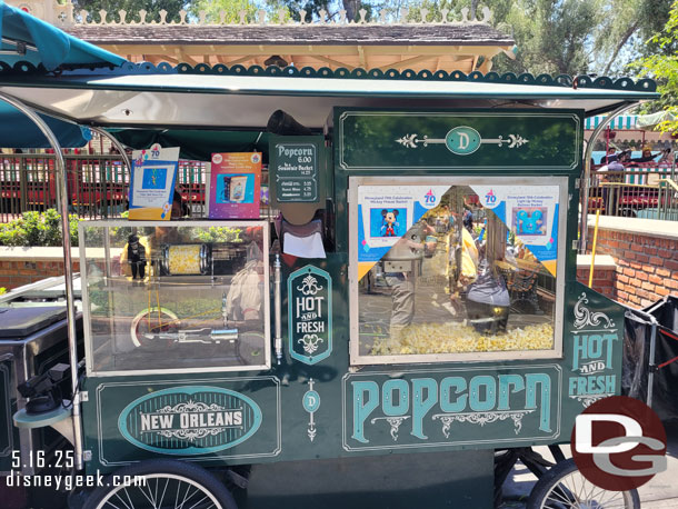 New popcorn buckets and other items are available throughout the park to celebrate the 70th.