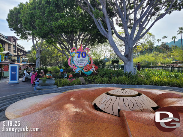 Downtown Disney has activation spots, banners, and window displays for Disneyland 70th.
