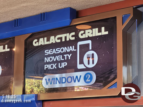 Galactic Grill has a set of windows dedicated to mobile pickup of the popcorn buckets and sippers.