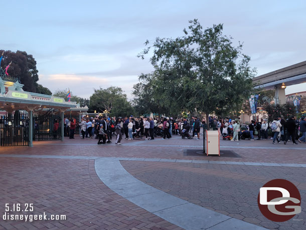 7:37pm - The queue to enter Disneyland stretched to the Monorail this evening.