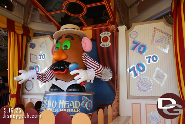 70th Anniversary stickers throughout Toy Story Midway Mania