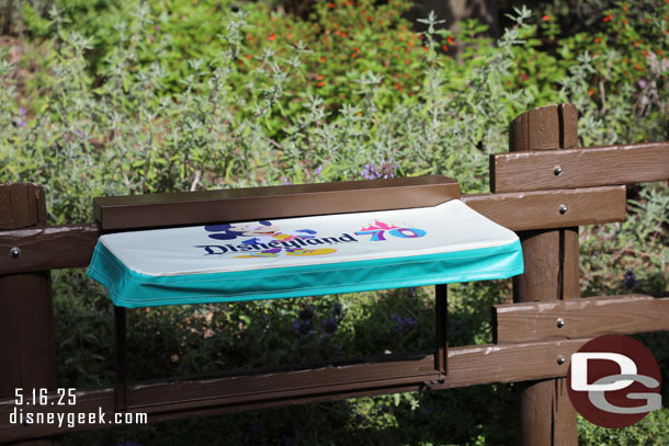 The tables on the fences from the festivals are still around and have 70th covers