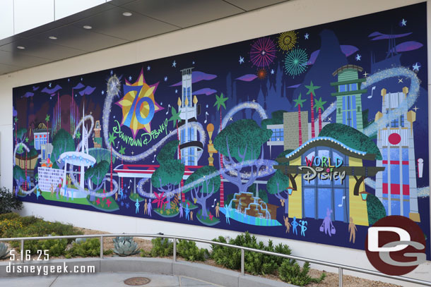 Disneyland 70th Anniversary Mural on the restrooms near the Downtown Disney security checkpoint.