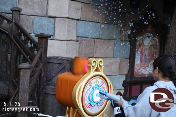 It lights up and blows bubbles in addition to some sound.